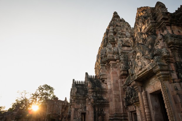 The sun sets over the Phanom Rung temple in northeast Thailand on Nov. 4, 2022. Artifacts removed from the historic site are now in museums outside Thailand. (Photo by Athikhom Saengchai/Special to The Denver Post)