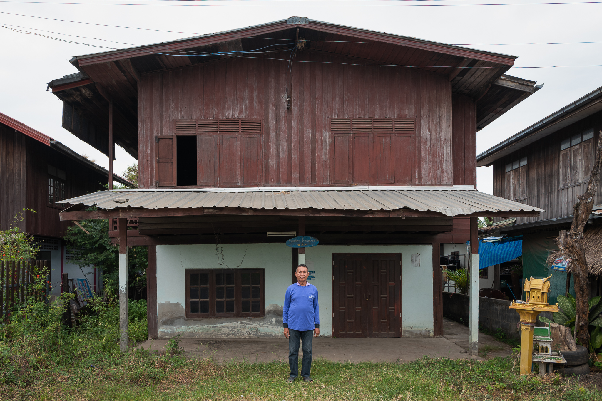 Satien Rojanabundit is pictured outside his father's former home in Buriram Province, Thailand, on Nov. 5, 2022. Rojanabundit was a child when art collector Douglas Latchford came to the village to purchase artifacts looted from the nearby Plai Bat II temple. Latchford used the house as a base of operations with Bangkok buyer named Boonlerd. (Photo by Athikhom Saengchai/Special to The Denver Post)