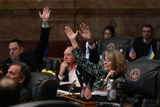 From left to right Senators Byron Pelton, Larry Liston, and Barbara Kirkmeyer raise their hands for a No vote on SB23B-001 in the Senate chambers during a special session at the Colorado Capitol in Denver on Nov. 19, 2023. (Photo by Helen H. Richardson/The Denver Post)
