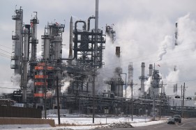 The Christmas Eve fire that injured two workers at Suncor Energy's Commerce City refinery began when a vapor cloud leaked from an unused pump valve and exploded as the facility was being shut down after extreme cold caused equipment failures, according to a federal investigation.