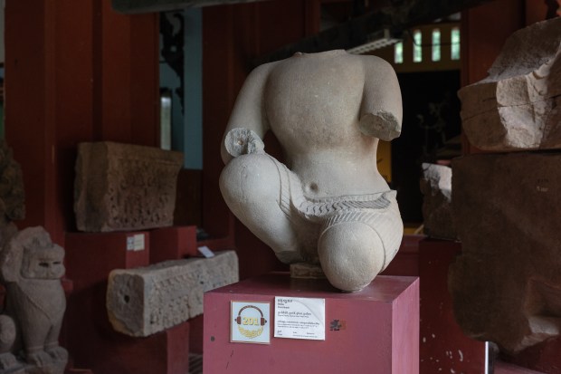 A Bossu (Hunchback) statue gifted by Douglas Latchford is on display inside the National Museum of Cambodia in Phnom Penh on Aug. 8, 2022. (Photo by Cindy Liu/Special to The Denver Post)